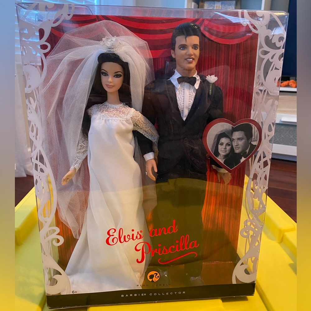 Elvis and Pricilla wedding collector Barbie doll. Never opened.